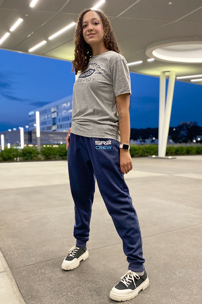 Image shows Mass Effect SR-2 Crew Member Lounge Set worn by female model facing at an angle. The Normandy SR-2 first enters service in 2185, and serves as the "successor" to the SR-1. The Illusive Man had Cerberus build the SR-2 for the newly-revived Commander Shepard's team to aid them in their mission to stop the Collectors' galaxy-wide campaign of human abductions. The ship serves as the headquarters of the Lazarus Cell.